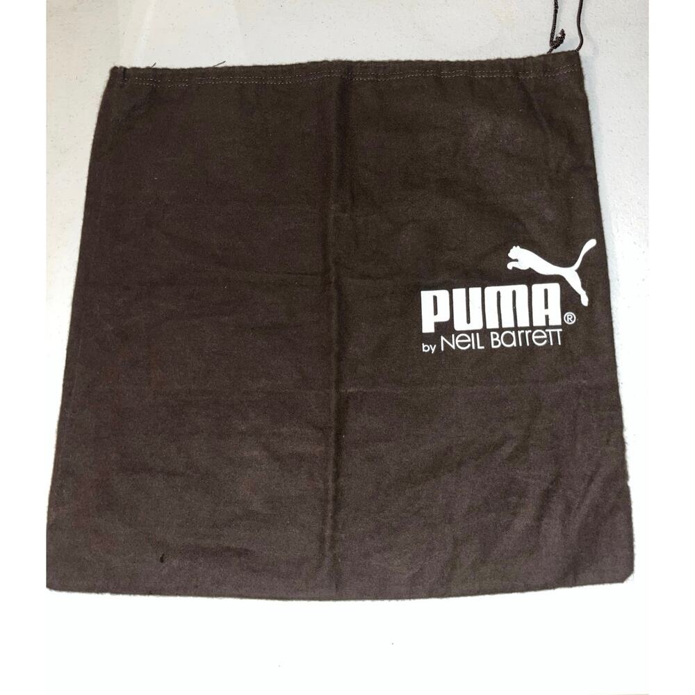 Brown and white puma dust bag by Neil Barrett